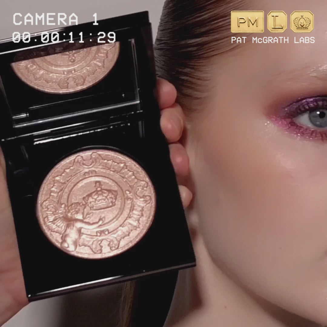 Load and play video in Gallery viewer, Pat McGrath Skin Fetish Heart&amp;#39;s Desire Edition: Sublime Skin Highlighter - Nude Opal (Coral Champagne with Iridescent Pearls)

