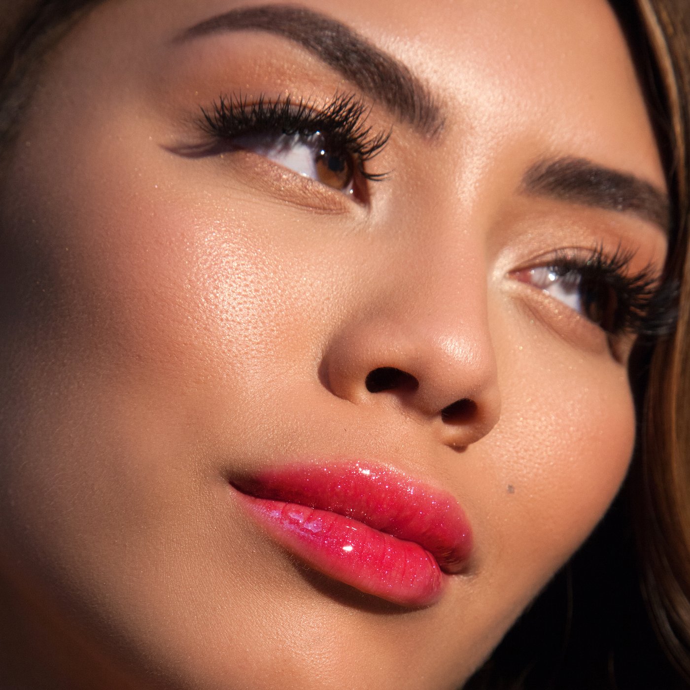 theBalm cosmetics PLUMP YOUR PUCKER® Lip Gloss Magnify - sheer magenta glitter