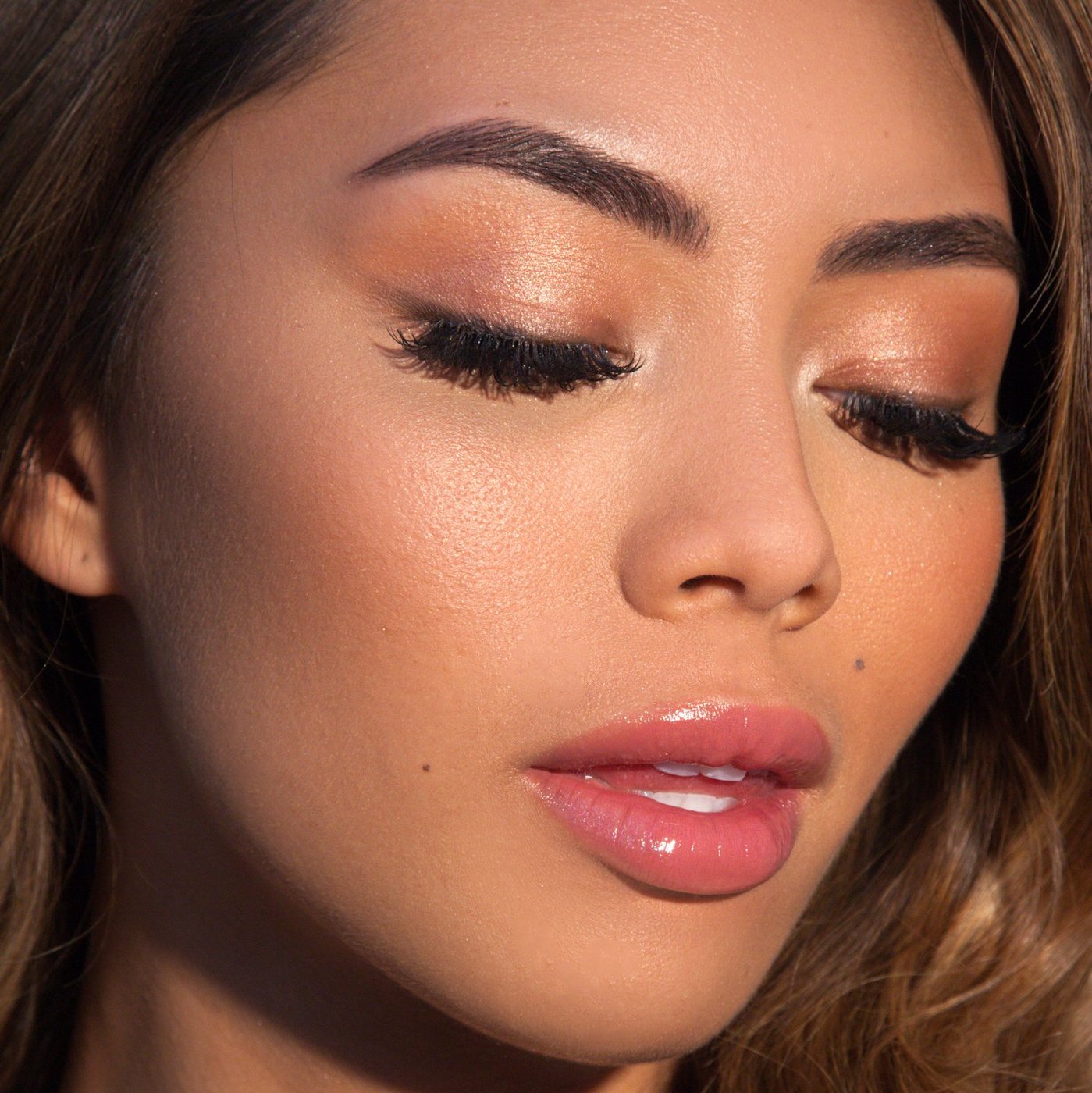 theBalm cosmetics PLUMP YOUR PUCKER® Lip Gloss Extravagant - shimmering golden plum